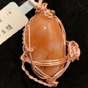 Red Chalcedony #14 with a wire rose twist, Polished Stone Pendant